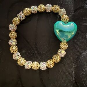 Tiffany & Co. Gold and Silver Bracelet with Teal Heart Charm